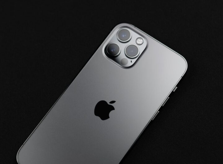 silver iphone 6 on black surface