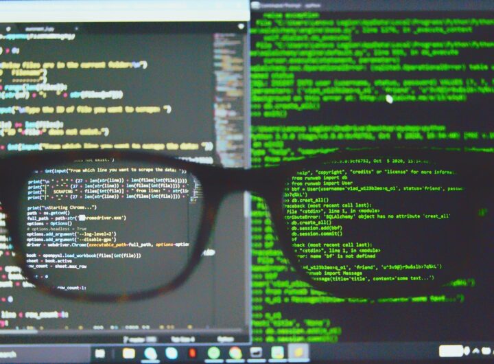 black framed eyeglasses on computer screen