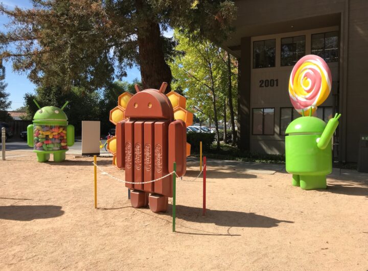 green and red metal trash bins
