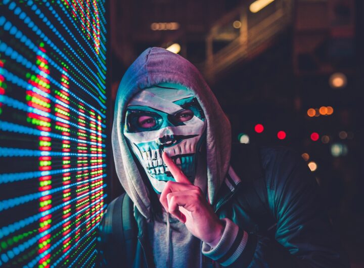 person standing near LED sign