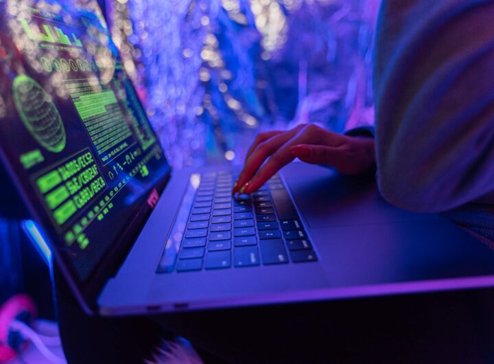 person using black laptop computer