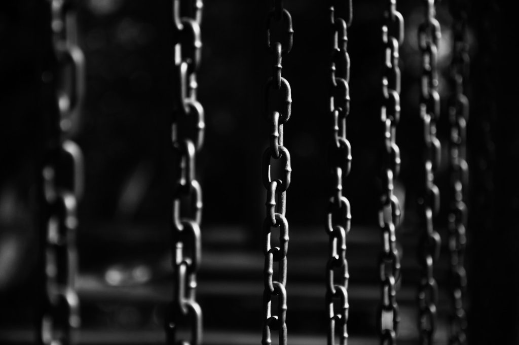 grayscale photo of chain link