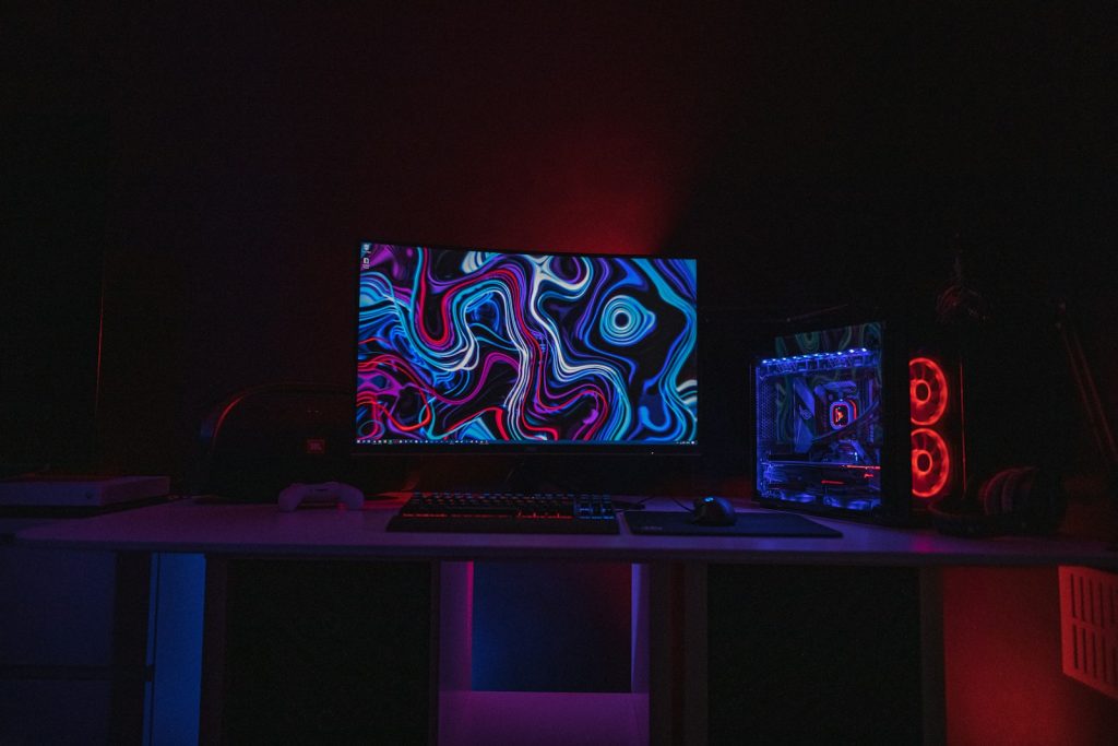 black flat screen computer monitor turned on displaying desktop