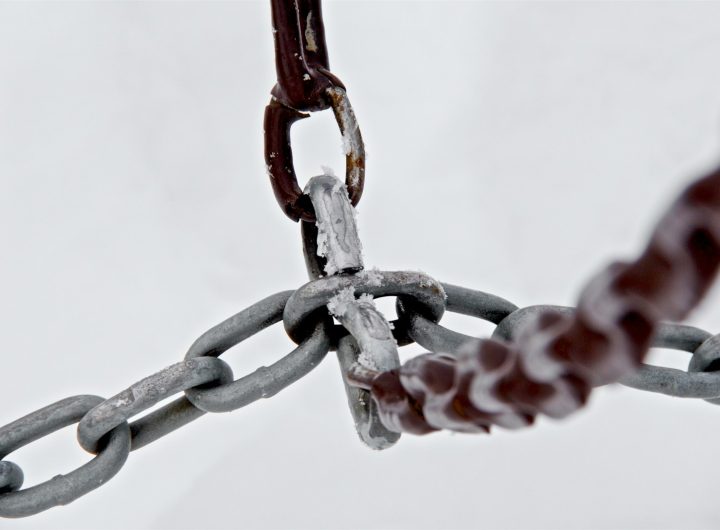 selective focus photograph of gray metal chains