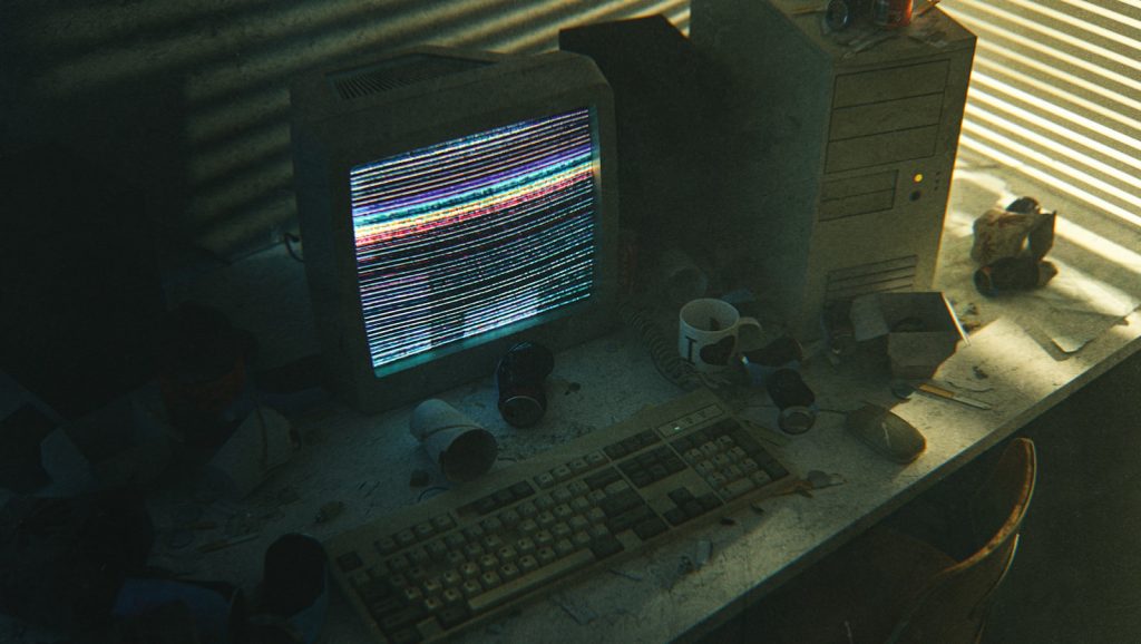 a desktop computer sitting on top of a wooden desk