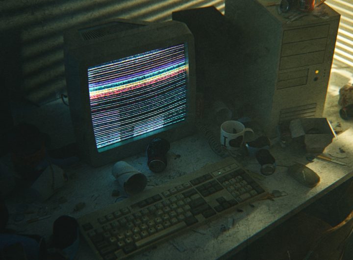 a desktop computer sitting on top of a wooden desk